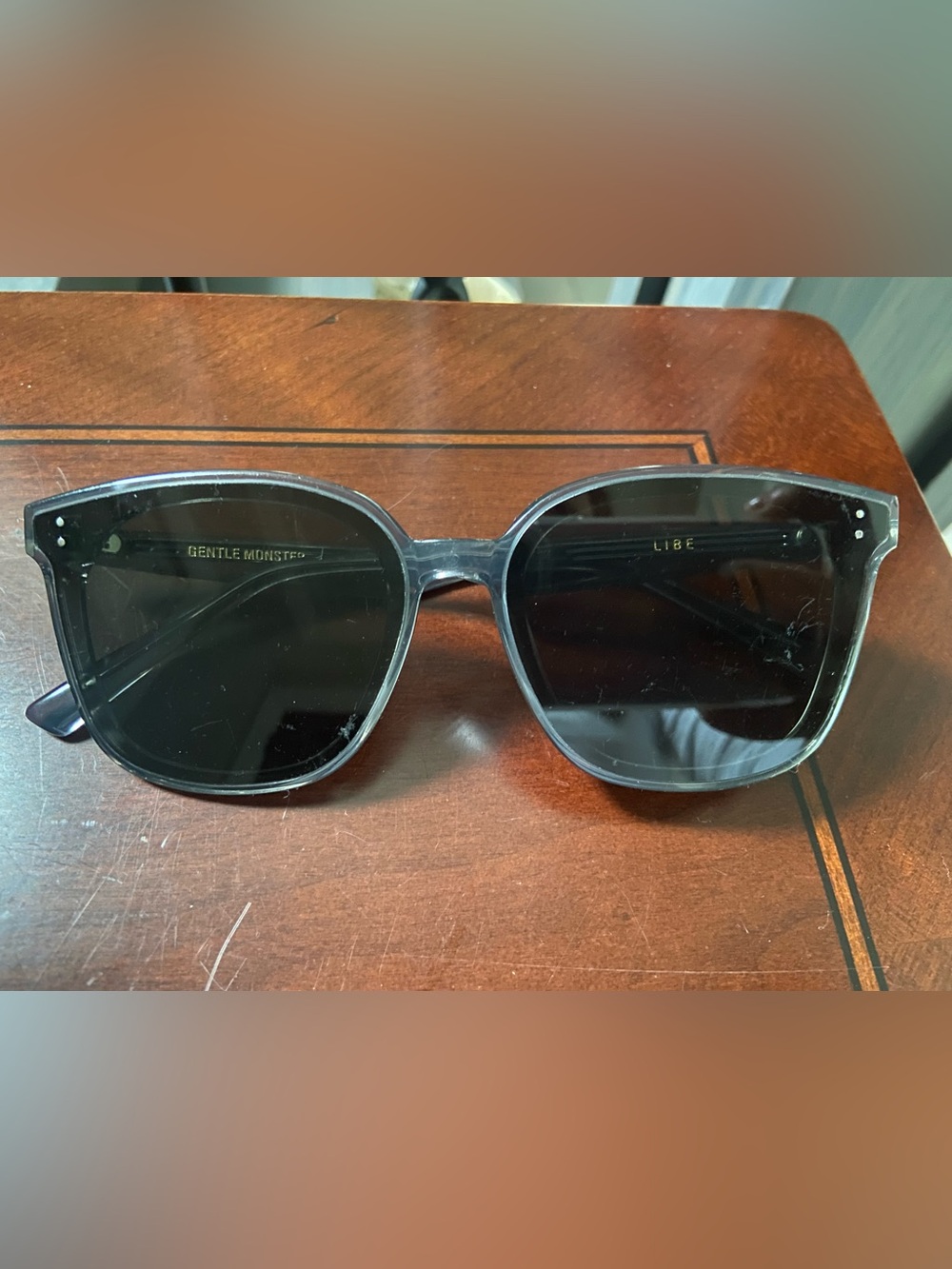 GENTLE MONSTER Translucent Gray Frame Black Lens Sunglasses